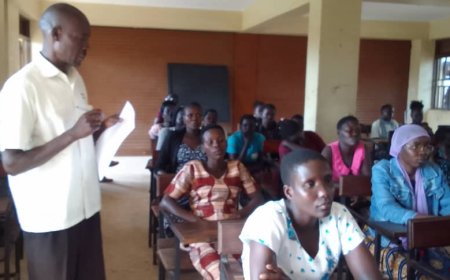 Loro Core PTC Principal Okada Patrick ,ECD Facilitator Amoki Morris Encourage Community to Embrace ECD Learning