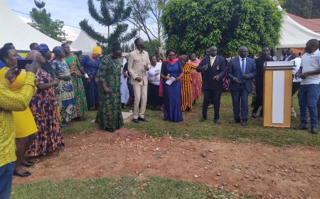 Dr.  Aceng Ocero Commends Dr. Patrick Olet for Advancing Education As St Gracious Schools Passesd Out Patriotism Class
